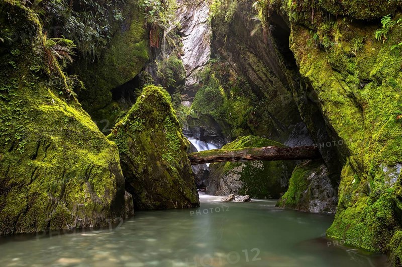 Narrow gorge with waterfall