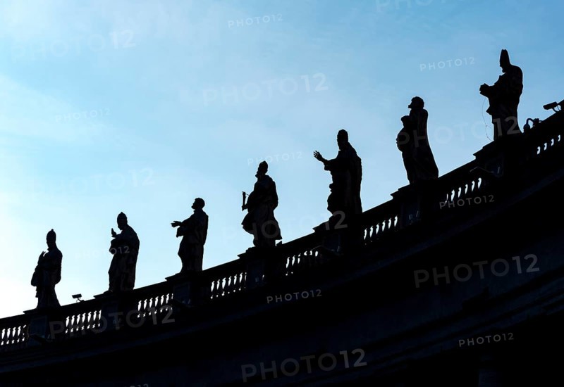 Silhouettes of statues of saints on Bernini colonnades