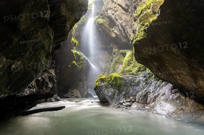 Narrow gorge with waterfall