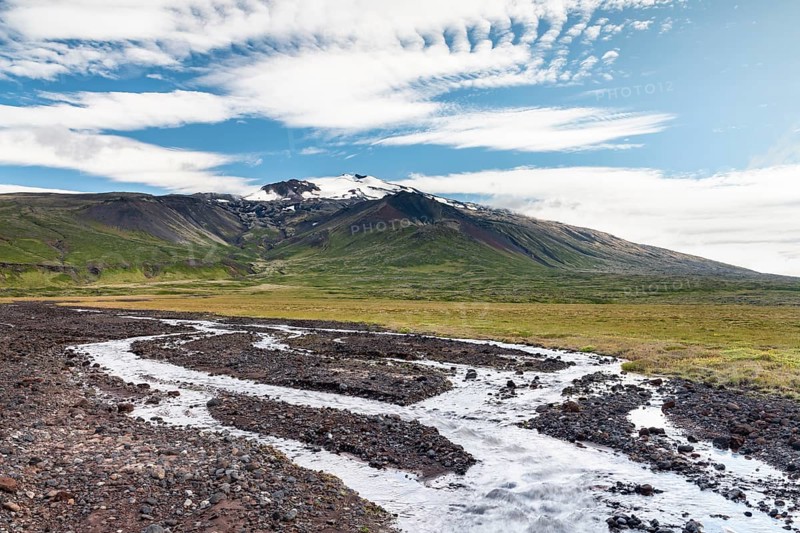 Creek in front of volcano Snaefellsjoekull