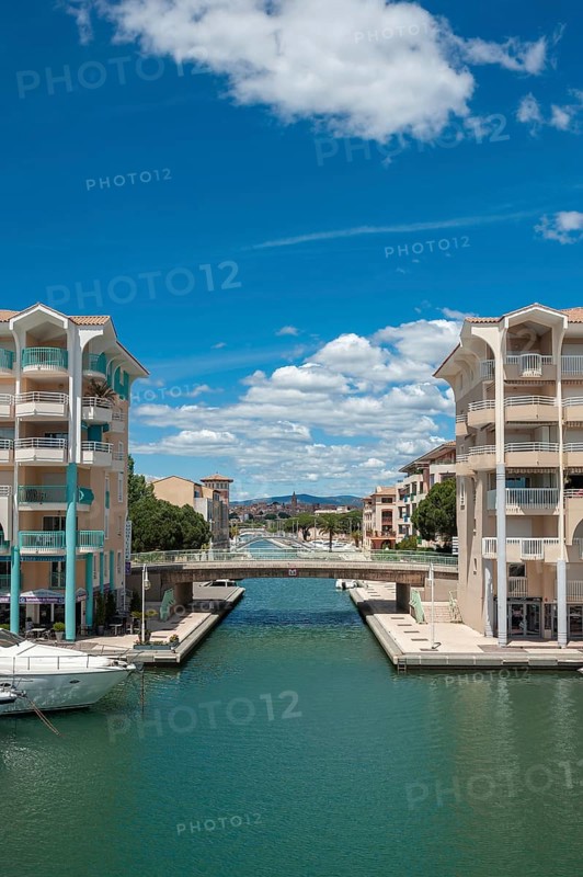 Marina of Port Frejus with the old town in the background