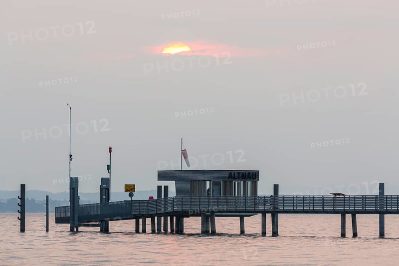 Longest jetty at Lake Constance in the morning light in Altnau
