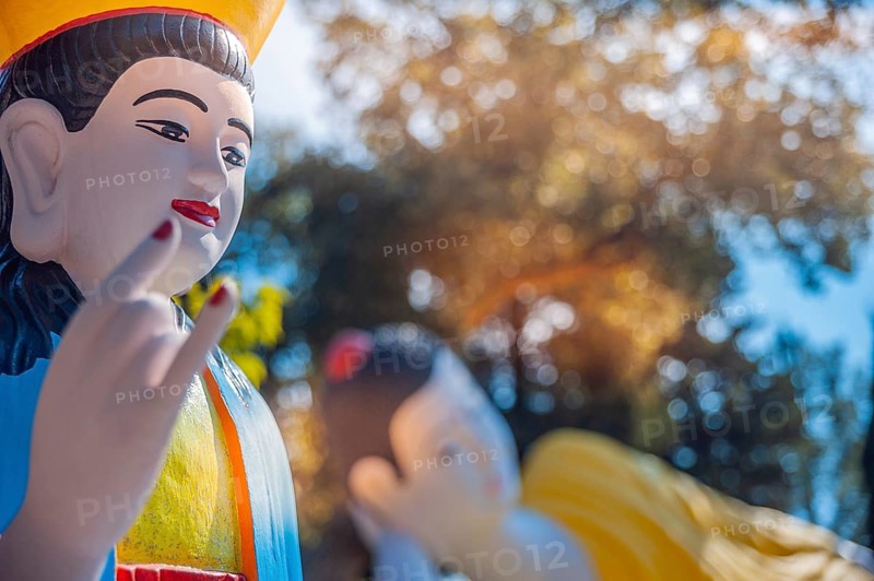 Holy figures with lying Buddha