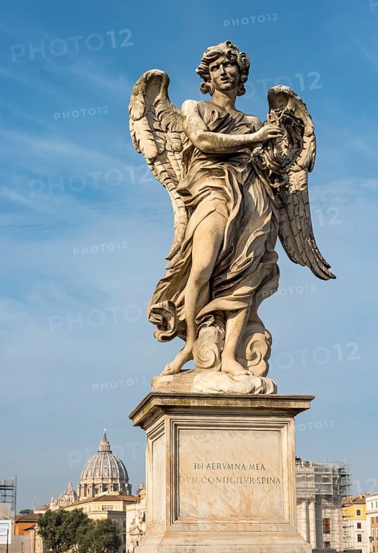 Angel statue and St. Peter's Basilica