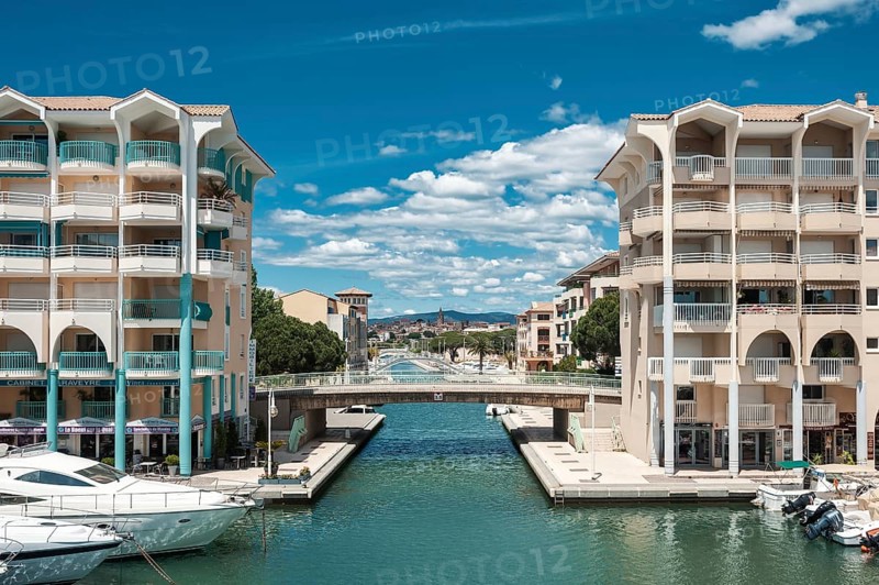 Marina of Port Frejus with the old town in the background