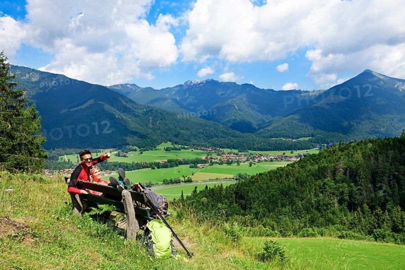 Hikers enjoy the view from alpine restaurant