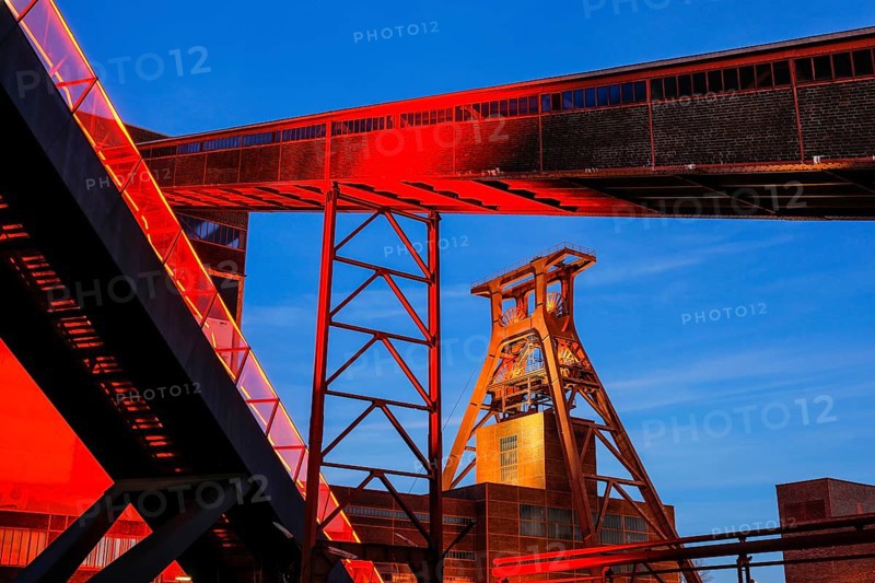 UNESCO World Heritage Zeche Zollverein illuminated red in the evening