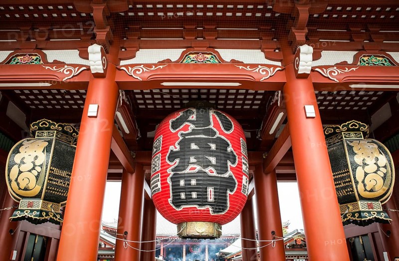 Large red Chochin lantern and two copper lanterns
