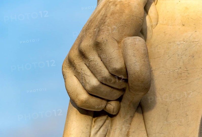 Close-up of hand of athlete statue at Stadio dei Marmi