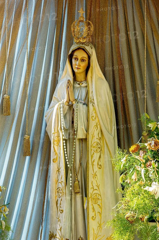 Statue of the Virgin Mary with golden crown of the Virgin Mary