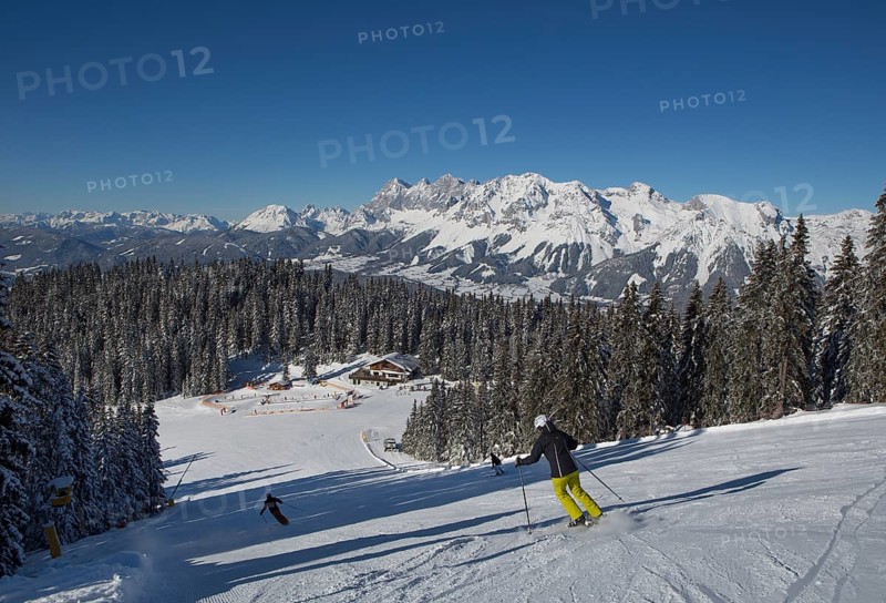Ski area Planai with fairytale meadow hut and view to the Dachstein massif