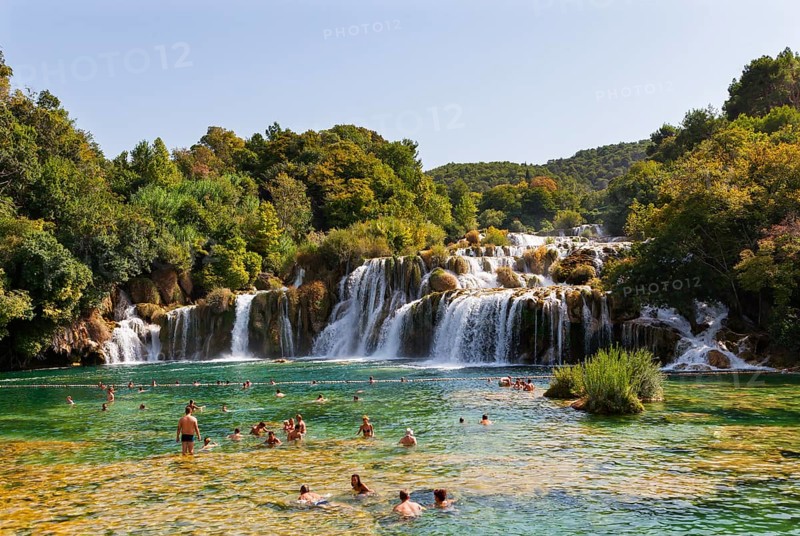 Tourists bathing at the Skradinski Buk waterfall