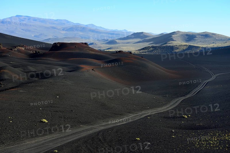 Track through volcanic lunar landscape
