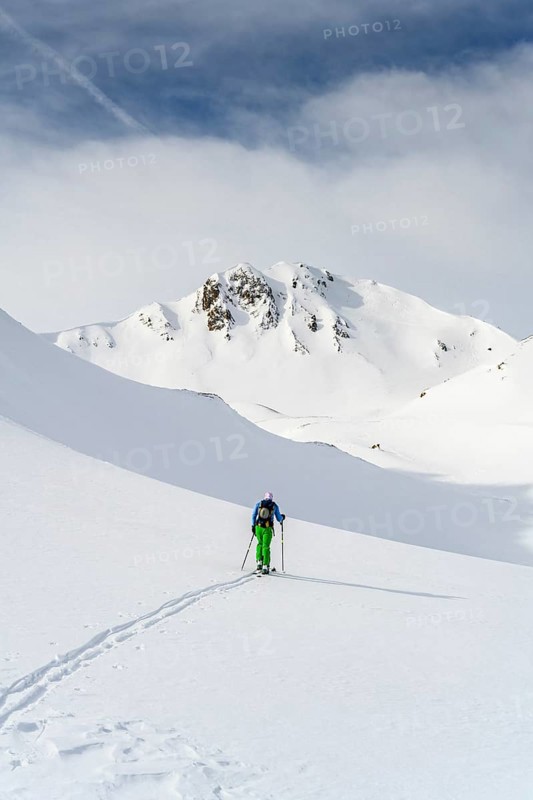 Ski tourers in the snow