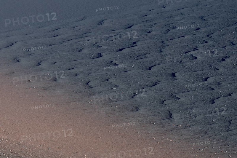 Volcanic soil in red and black
