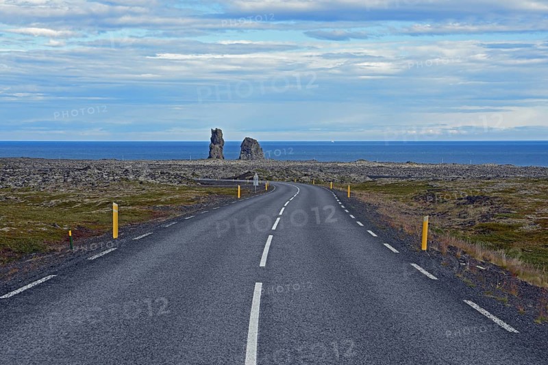 Country road leads to two bizarre rocky needles