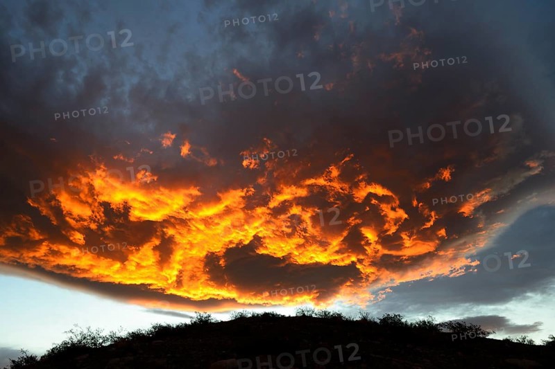 Burning clouds at sunset