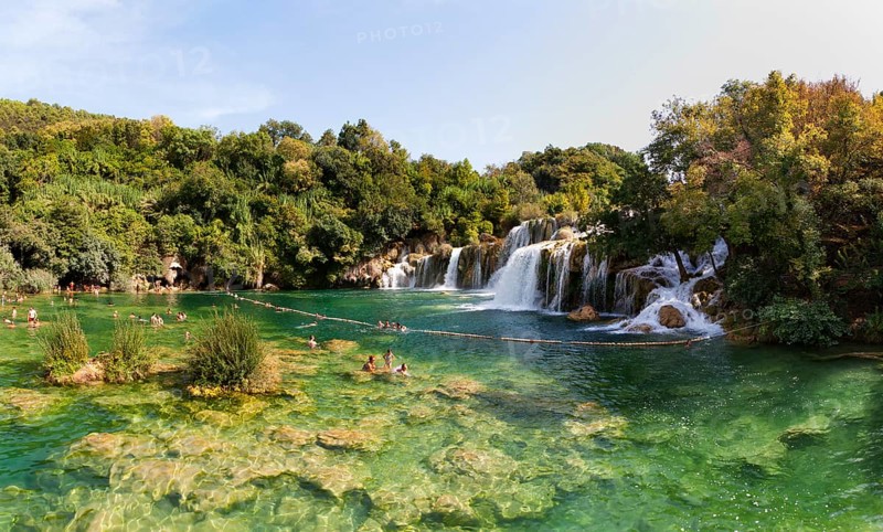 Tourists bathing at the Skradinski Buk waterfall