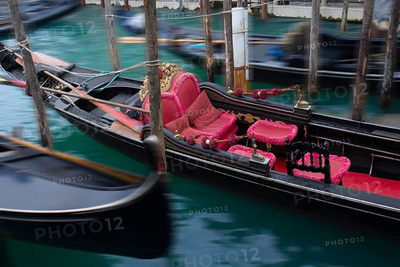Gondola with red seat cushions