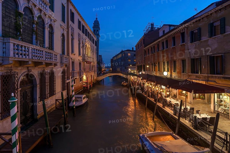 Evening atmosphere with restaurant on the canal