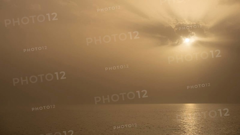 Sunset at Calima (sandstorm) on the Atlantic coast