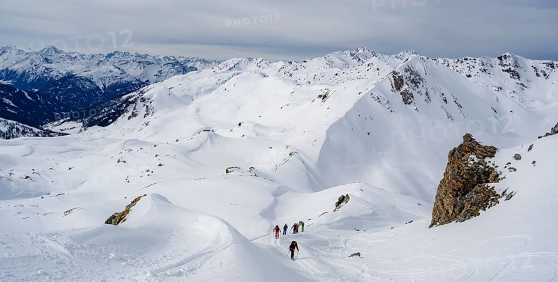 Ski tourers in the snow