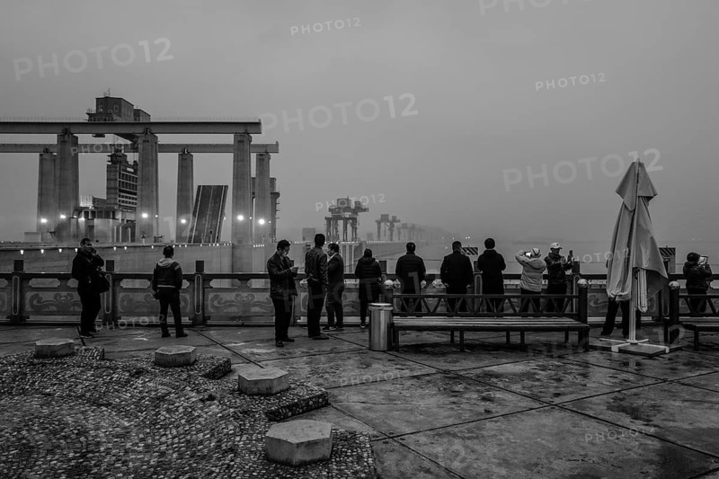 Chinese tourists on the dam of the power plant at the Three Gorges Reservoir