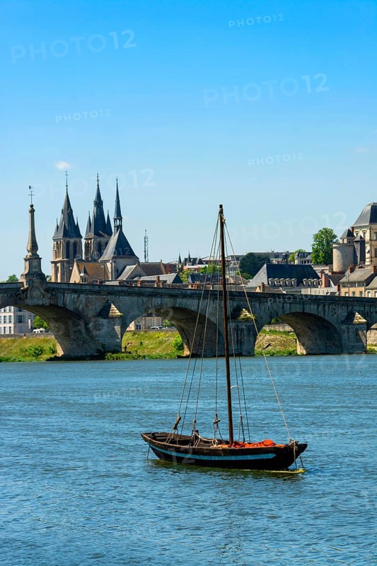 The Cessart bridge and Chateau de Saumur on river Loire