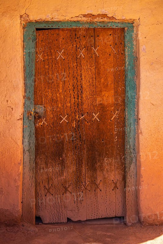 Entrance made of cactus wood with animal tendons