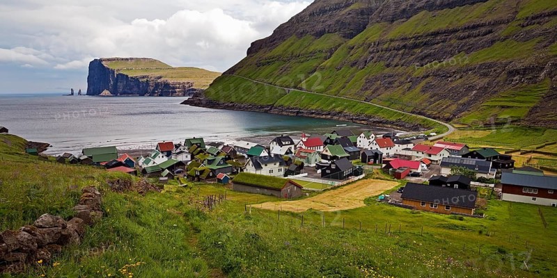 The small village of Tjornuvik with view of the Atlantic Ocean