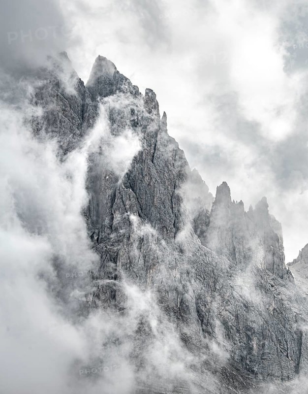Cloud-covered rocky peaks
