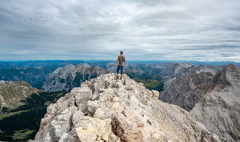 Hiker at the summit of the Birkkarspitze