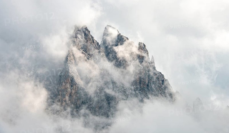 Cloud-covered rocky peaks