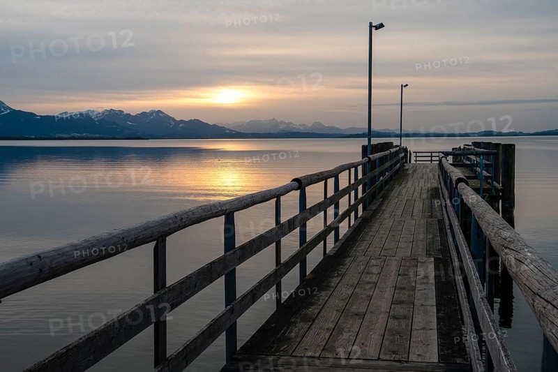 Footbridge at sunset at Chiemsee