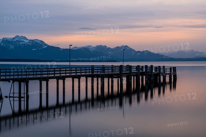 Footbridge at sunset at Chiemsee
