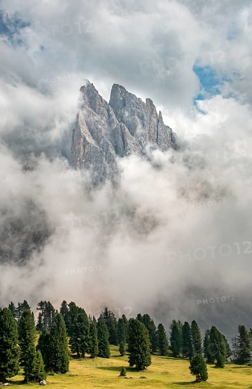 Cloud-covered mountain peaks