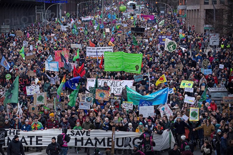 Luisa Neubauer and Greta Thunberg at the head of the Fridays For Future Demonstration in Hamburg