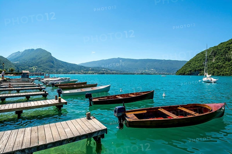 Annecy lake at Talloires village and Massif of Bauges