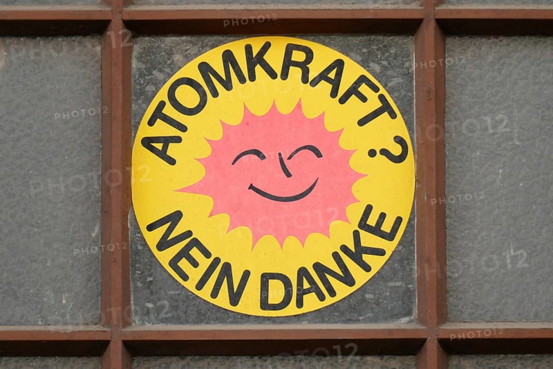 Sticker nuclear power No thanks on an old window