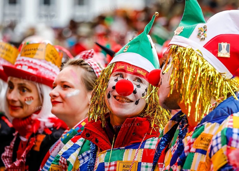 Colourfully costumed carnivalists celebrate carnival in Cologne