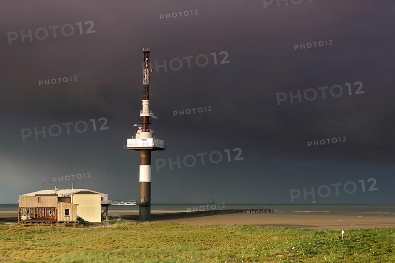 Radar tower on the Minsener Oog power plant in a bad weather front