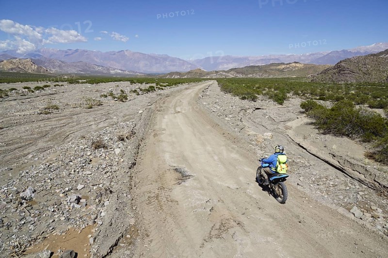 Motorcyclists on gravel road