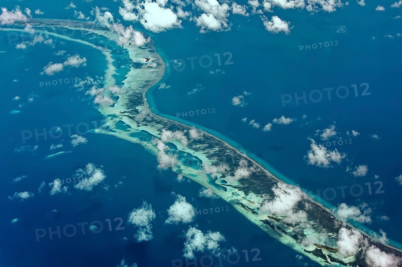 Outer reef with large dredged sand areas for land reclamation elsewhere
