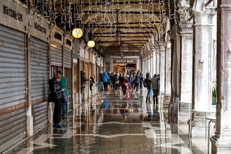 St. Mark's Square shops are protected from water during Acqua alta