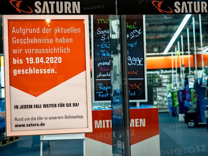 Sign at a Saturn consumer electronics store