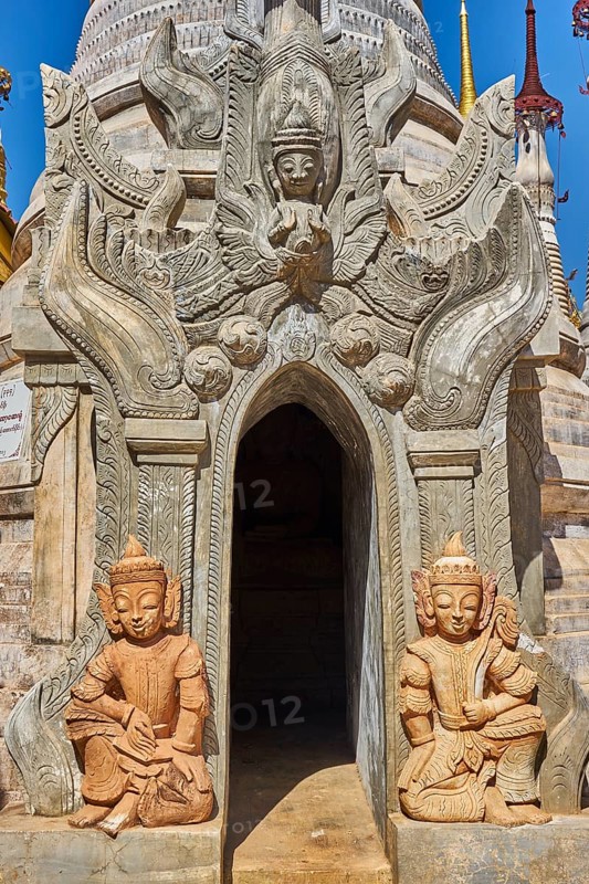 Guardian figures at tomb stupas