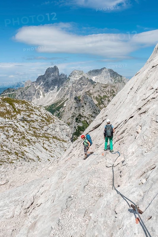 Mountaineer on marked secured route from Simonyhuette to Adamekhuette