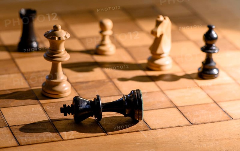 Chessboard with wooden chessmen