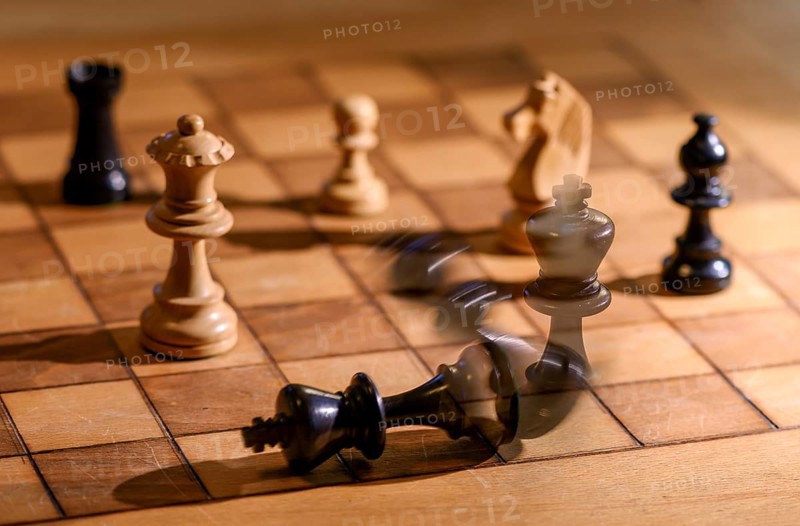 Chessboard with wooden chessmen