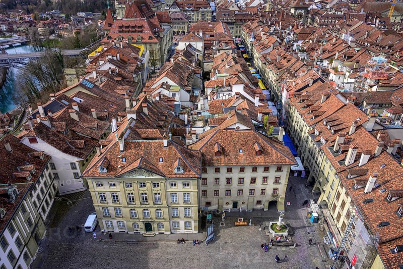View from the Bernese Minster to the Muensterplatz and the red tiled roofs of the houses in the historic centre of the old town